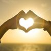 heart hands sunset
